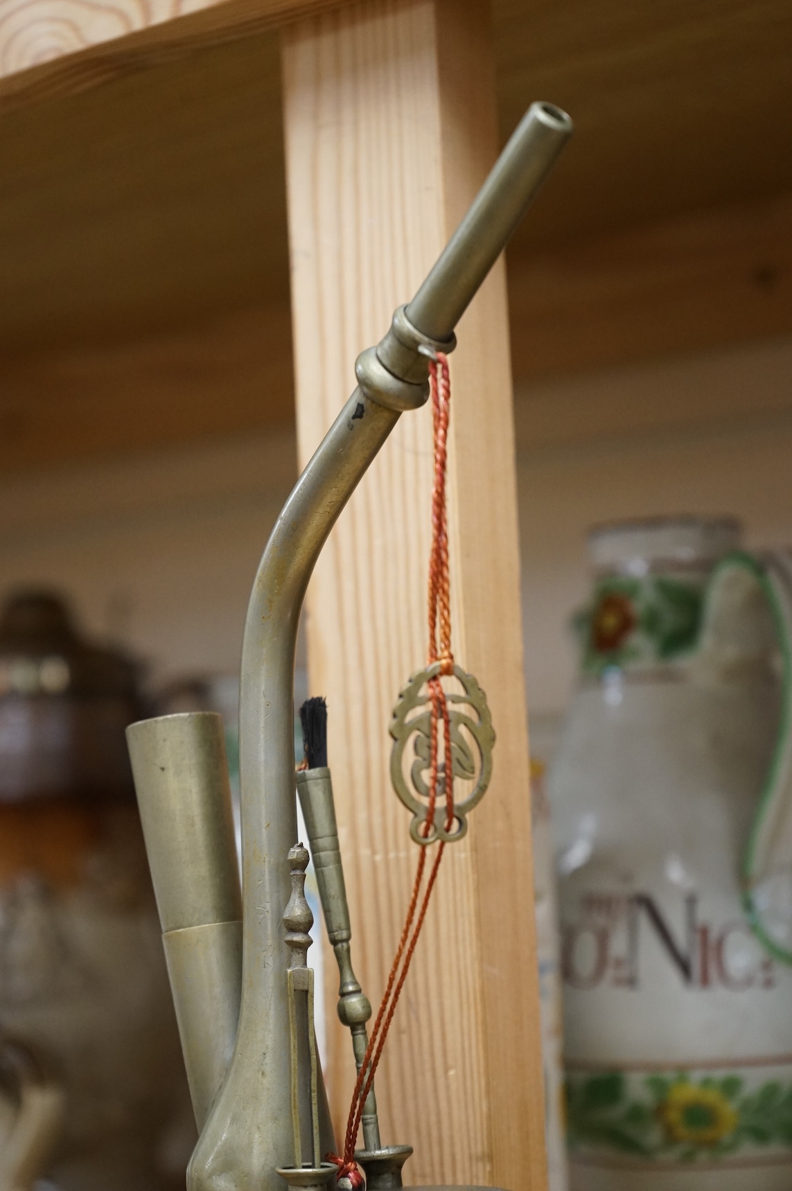 An early 20th century Chinese paktong water pipe, stamped maker’s mark, 26cm high